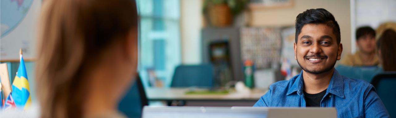 Student Andre Carwallio with laptop